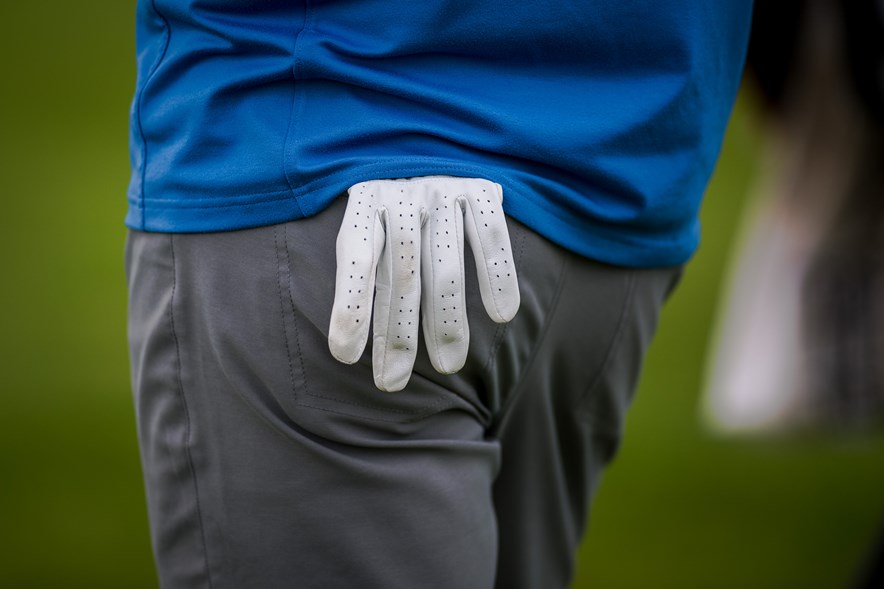 golfhandschoen broekzak