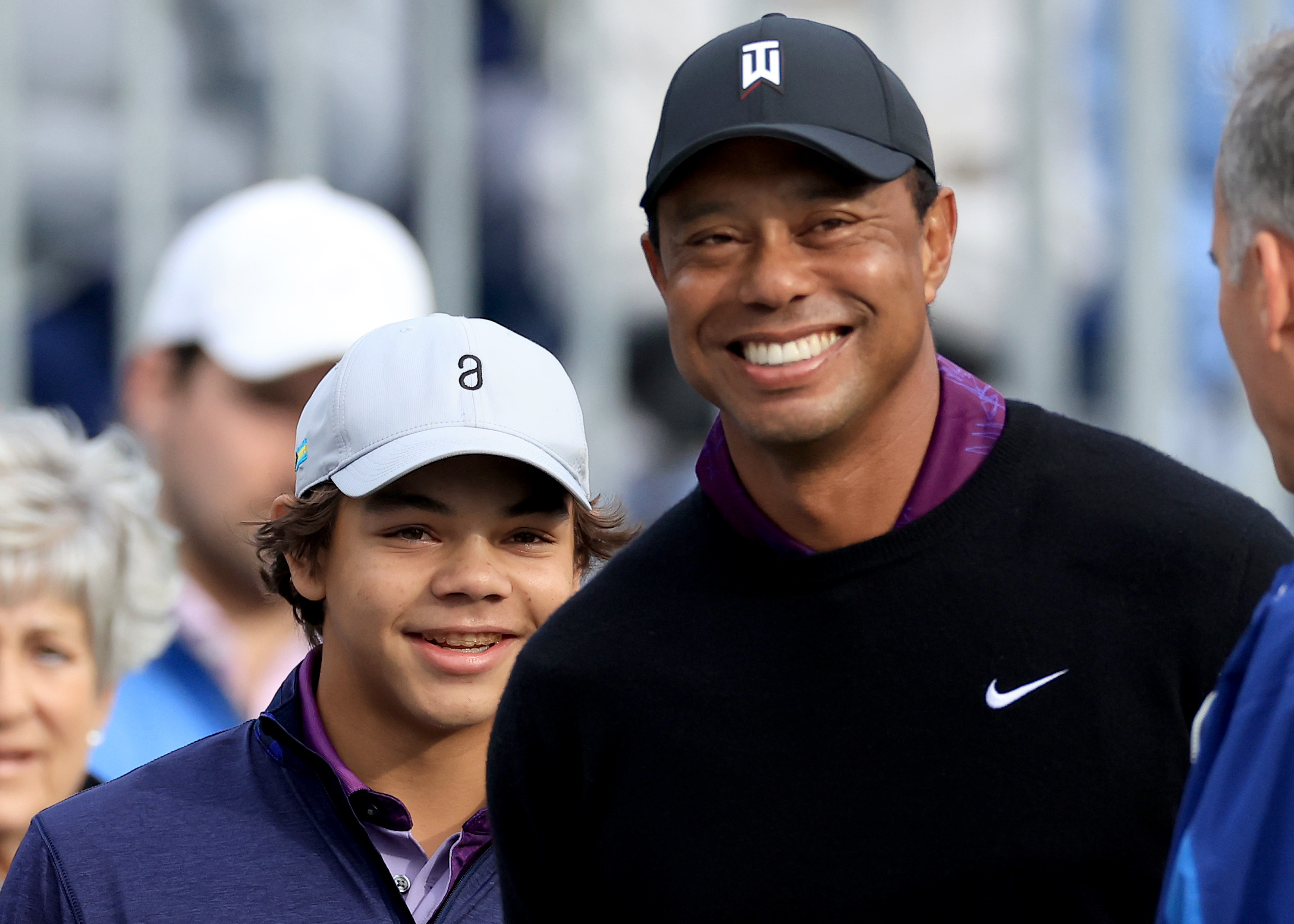 Charlie en Tiger Woods bij het PNC Championship