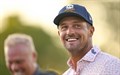 Bryson DeChambeau lacht