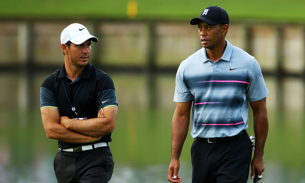 Chris Como en Tiger Woods