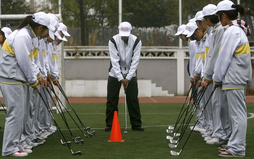 chinese schoolkinderen leren golf