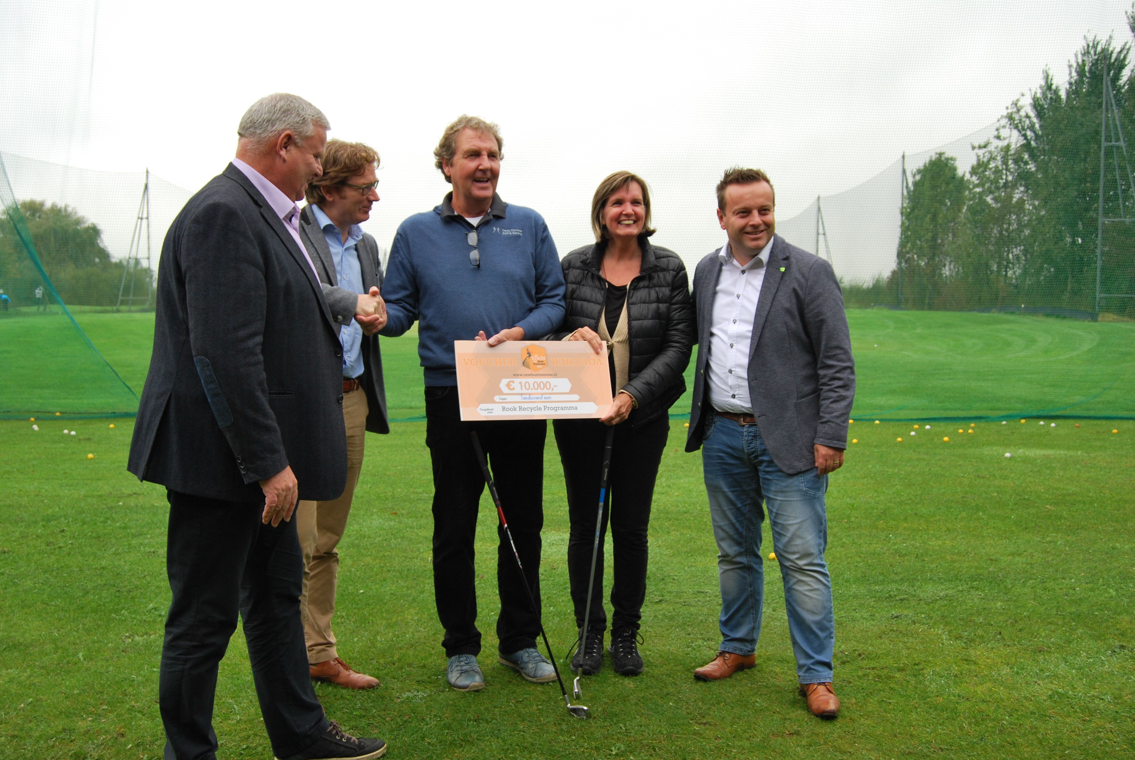 In het midden: pro Henk Timmer en Josine van Lith