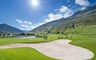 golfbanen in de Alpen van Zwitserland is hemels 