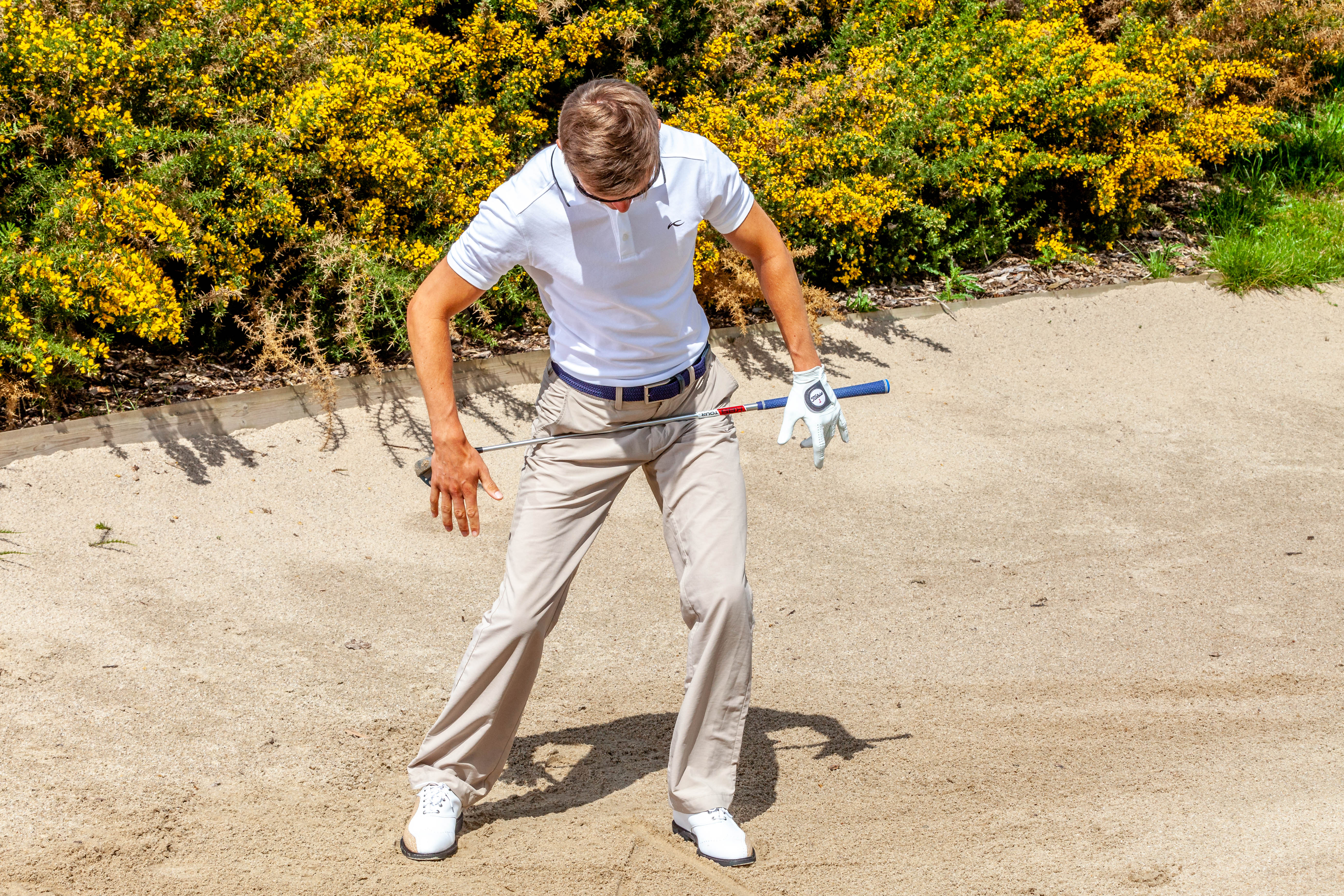 Golfinstructie bunker Huizing